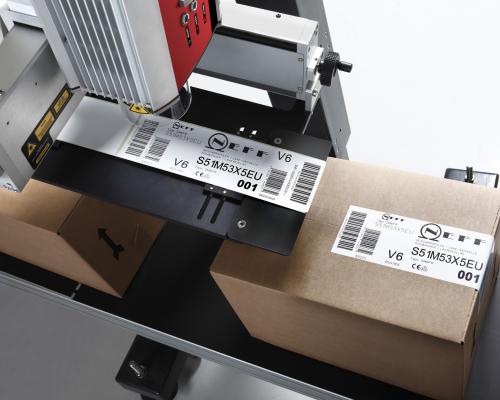 Marking and coding solutions on cardboard boxes for efficient logistics operations.