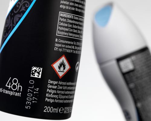 Printing batch numbers and QR codes on aluminum hygiene product packaging.