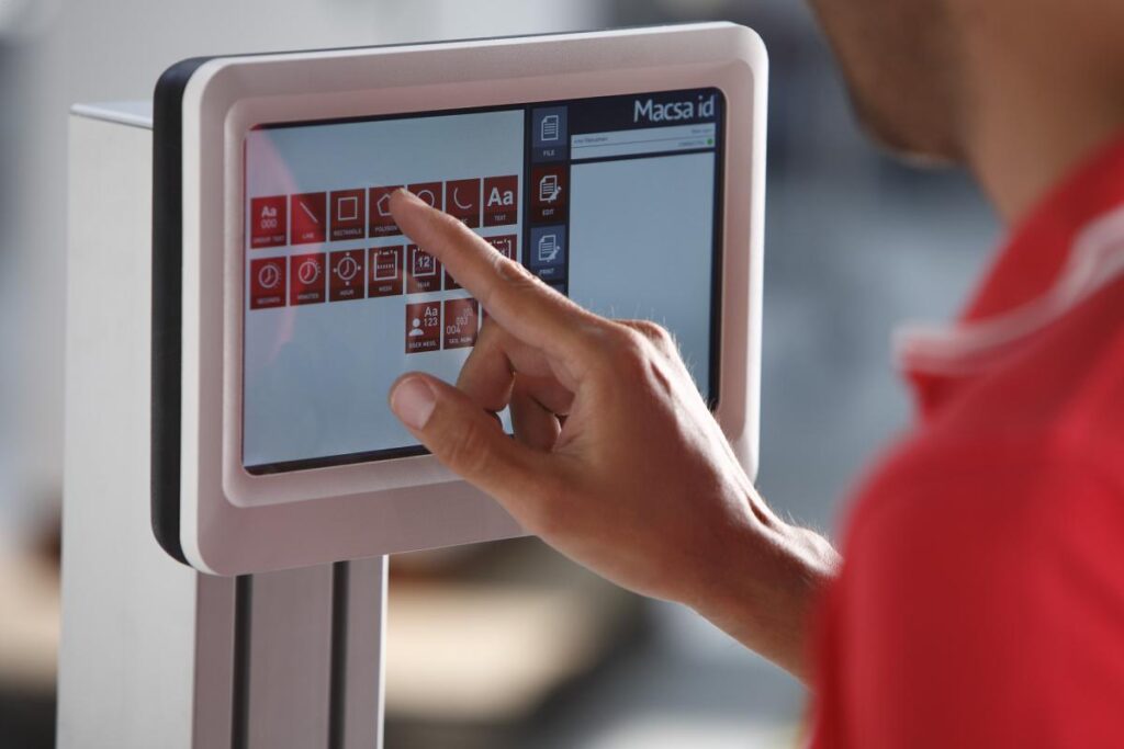 Technician providing real-time remote assistance for laser marking system